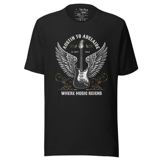 A vintage black t-shirt featuring an electric guitar with wings and the words "Austin to Adelaide 11 July 1983. Where music reigns".