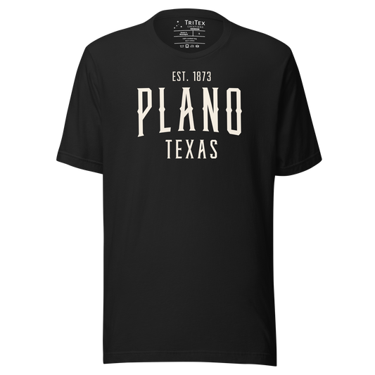 A vintage black t-shirt with the words "Plano Texas Est. 1873".