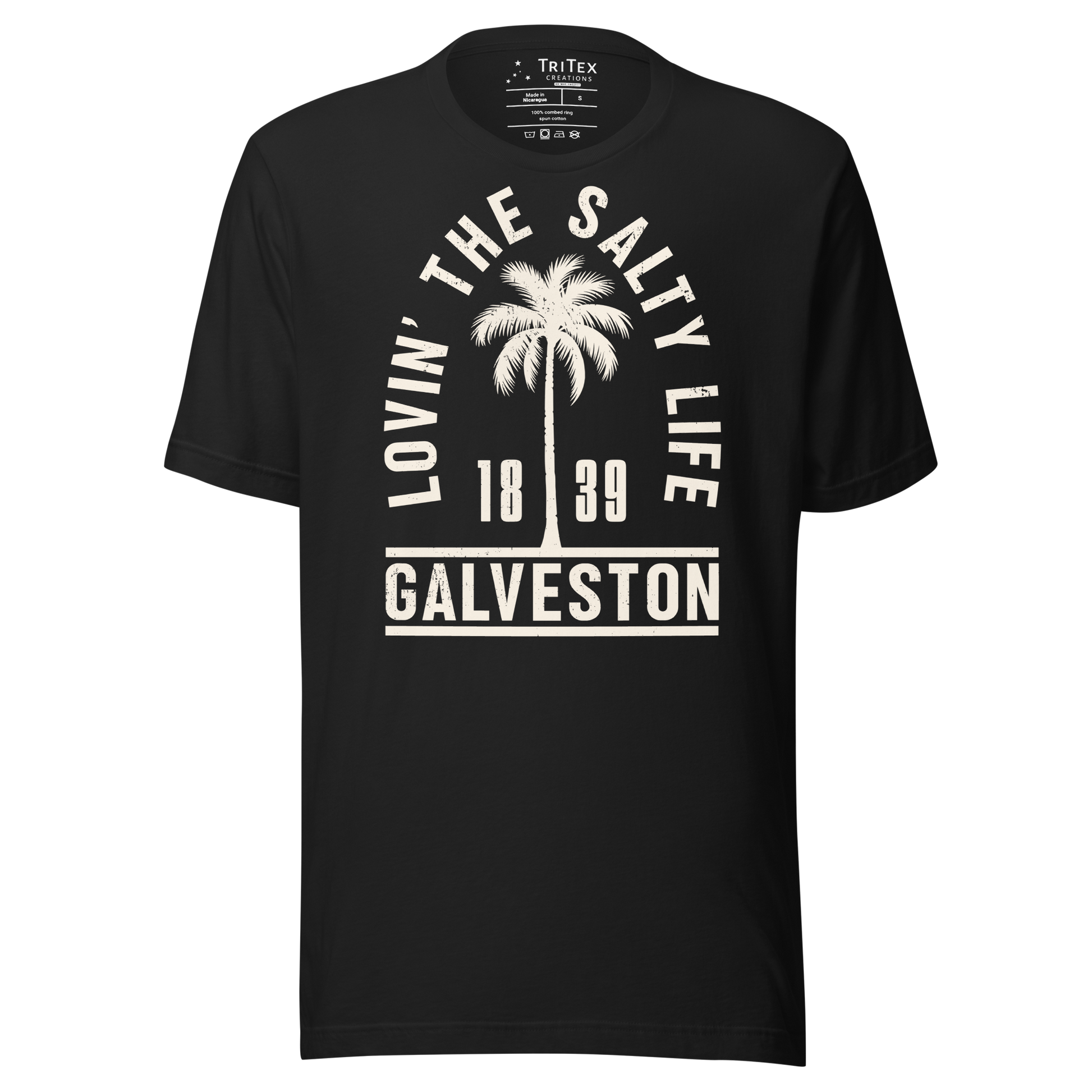 A vintage black t-shirt featuring the silhouette of a palm tree with the words "Lovin' the salty life. Galveston 1839".