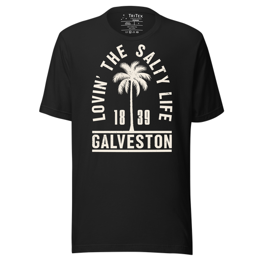 A vintage black t-shirt featuring the silhouette of a palm tree with the words "Lovin' the salty life. Galveston 1839".