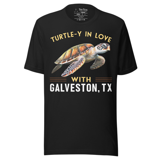A vintage black t-shirt featuring an illustration of a sea turtle with the text “Turtle-y In Love With Galveston, TX”.