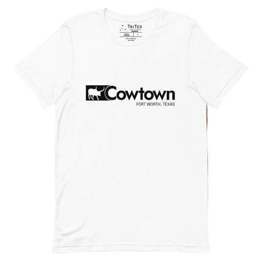 A white t-shirt which reads "Cowtown Fort Worth, Texas" in the style of the Wrangler logo.