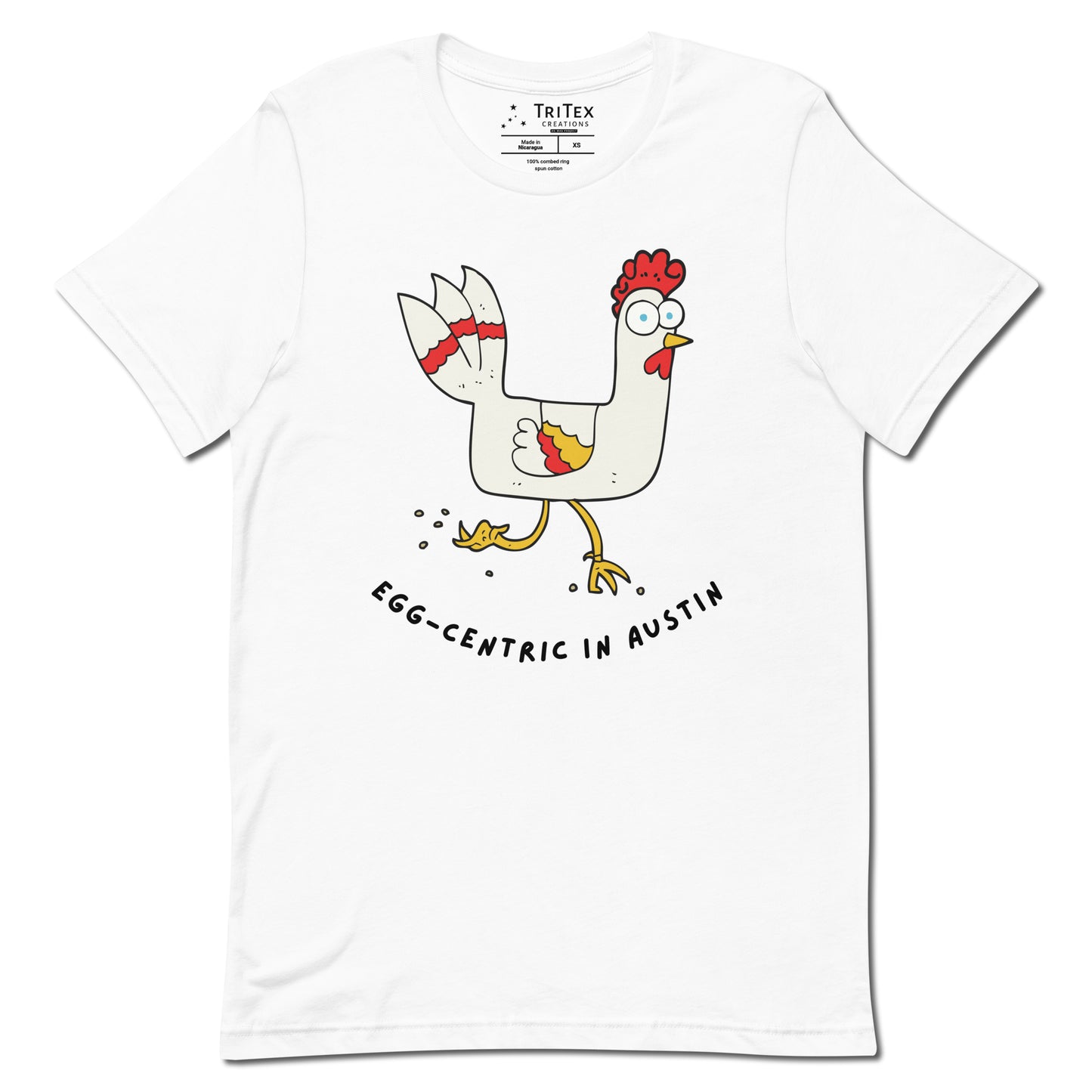 A white t-shirt featuring a strange looking rooster with text reading "Egg-Centric in Austin".