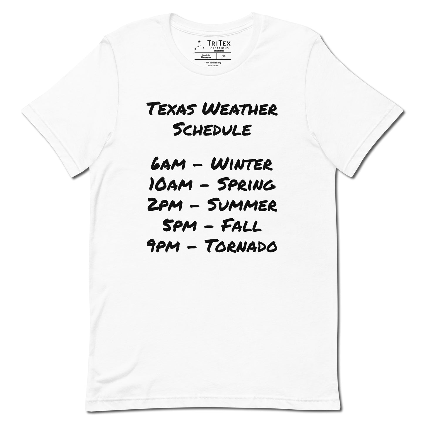 A white t-shirt with a handwritten list that reads "Texas Weather Schedule. 6AM - Winter. 10AM - Spring. 2PM - Summer. 5PM - Fall. 9PM - Tornado".