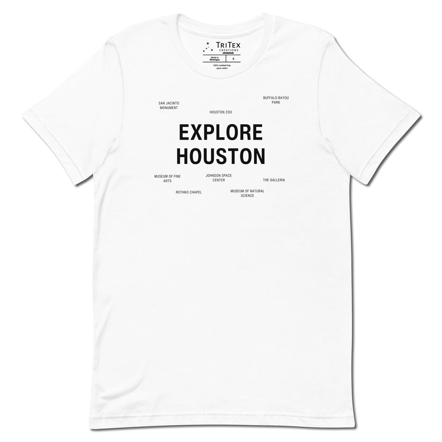 A white t-shirt which reads "Explore Houston" in big, bold text with smaller text elements naming Houston's landmarks.