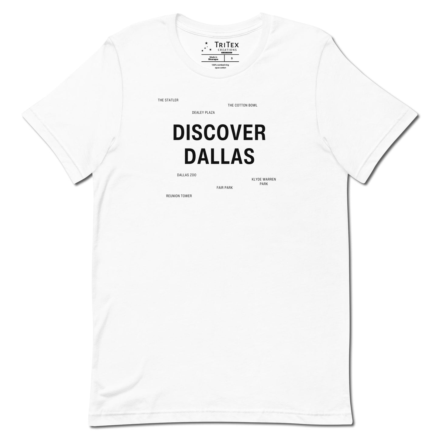 A white royal t-shirt which reads "Discover Dallas" in big, bold text with smaller text elements naming Dallas landmarks.