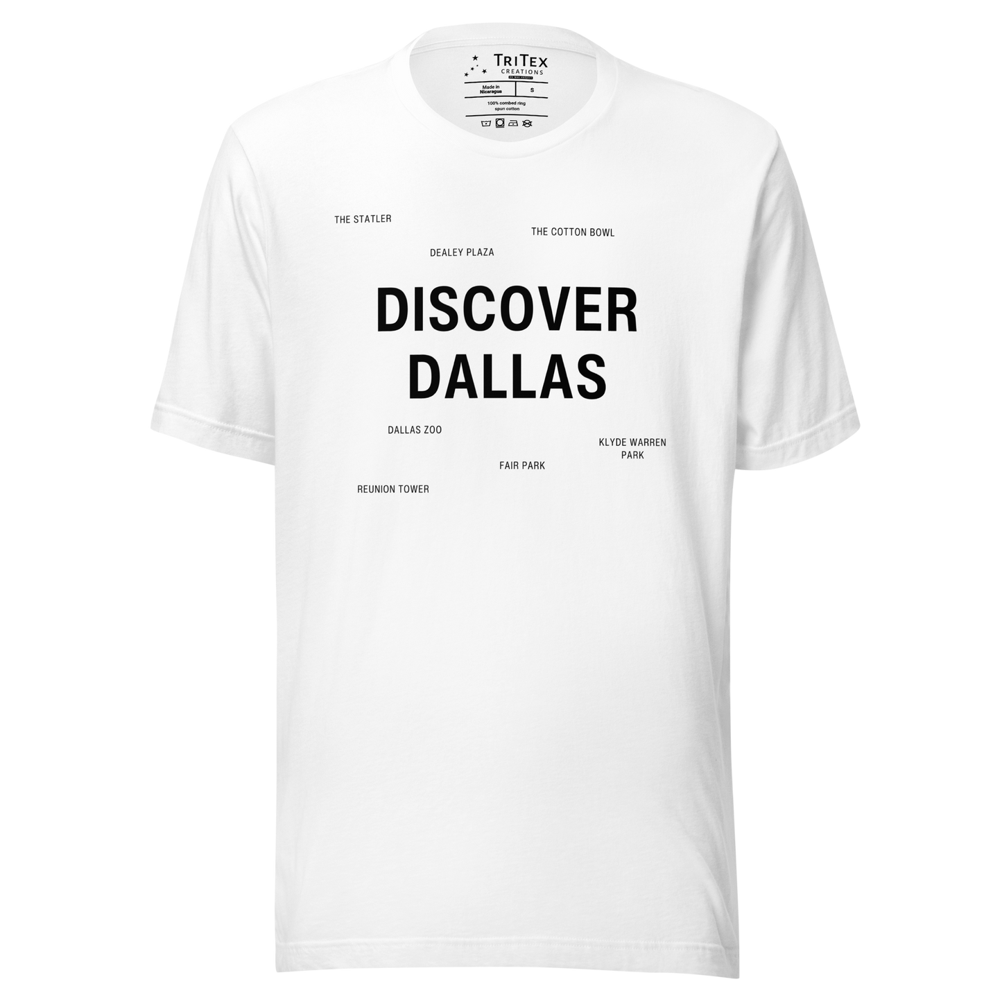 A white t-shirt featuring "Discover Dallas" in big, bold type surrounded by smaller names of local landmarks.