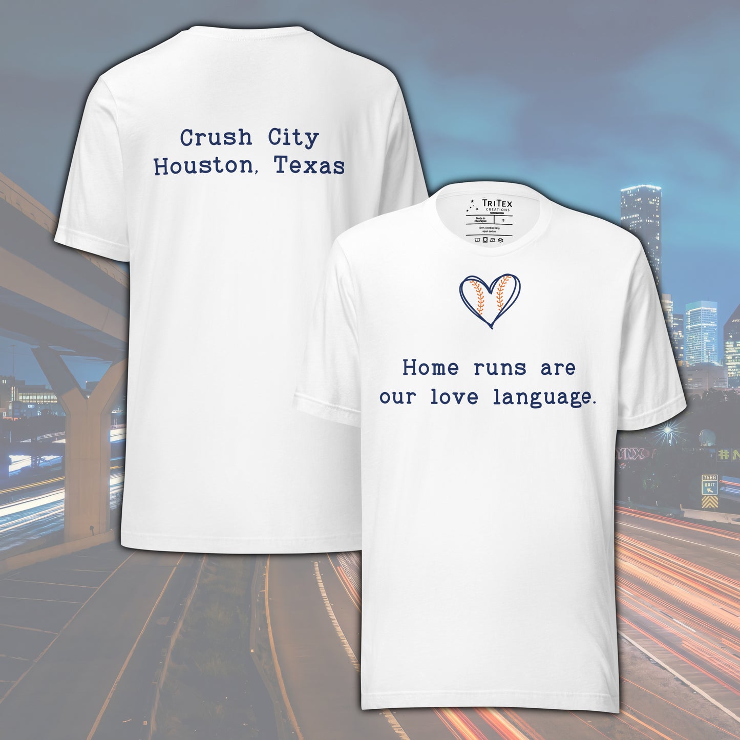 A white t-shirt picturing a heart-shaped baseball with the text "Home runs are our love language".